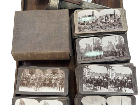 Two Stereoscopic viewers and a good collection of cards including some...