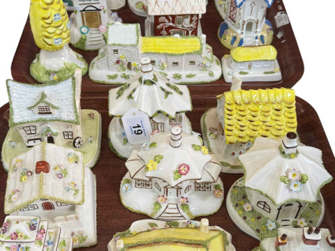Eighteen Coalport pastel burners and cottages.