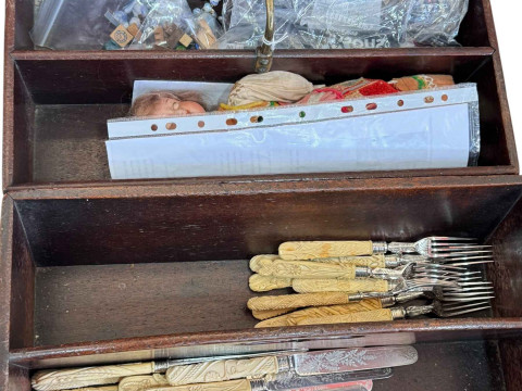 Two mahogany cutlery trays and cutlery, a small Armand Marseilles bisque head doll, walnut box with costume jewellery and brass cased carriage clock with case. thumbnail