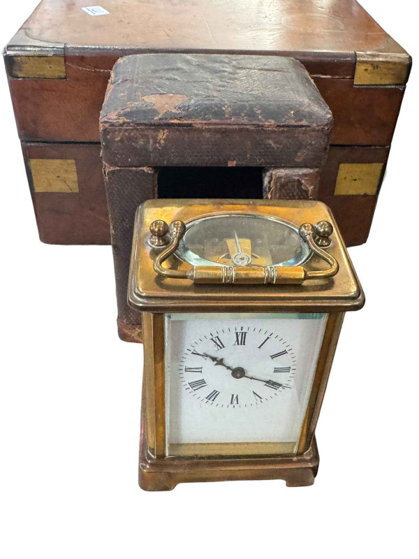 Two mahogany cutlery trays and cutlery, a small Armand Marseilles bisque head doll, walnut box with costume jewellery and brass cased carriage clock with case.