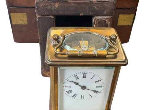 Two mahogany cutlery trays and cutlery, a small Armand Marseilles bisque head doll, walnut box with costume jewellery and brass cased carriage clock with case. thumbnail