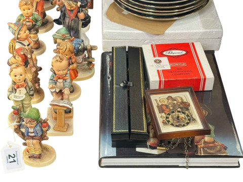 Thirteen Hummel figures, eleven Hummel collectors plates, Hummel album,...
