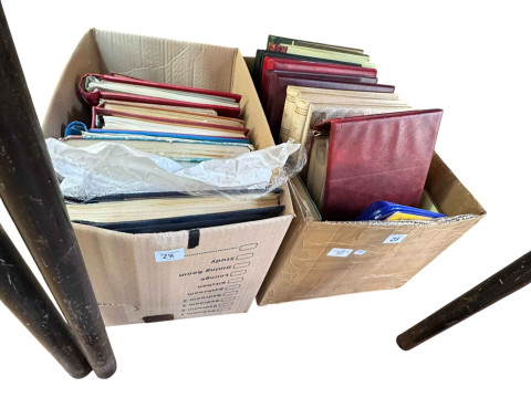 Two boxes of stamps, albums and FDC's.