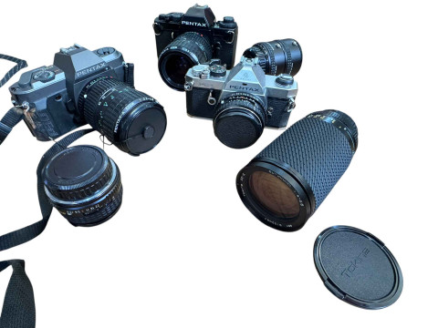 Selection of cameras including Pentax, lenses, flash guns, tripod, etc. thumbnail
