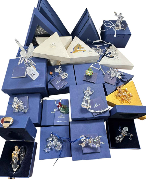 Collection of Swarovski boxed Christmas Tree decorations.