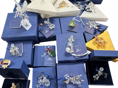 Collection of Swarovski boxed Christmas Tree decorations.