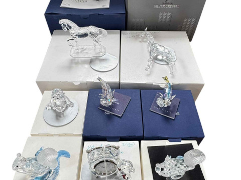 Ten boxed Swarovski Animals and Fish ornaments including Pandas, Baby...