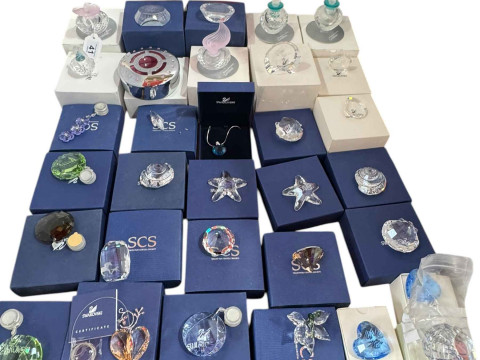 Collection of Swarovski including scent bottles, six sun catchers, two...