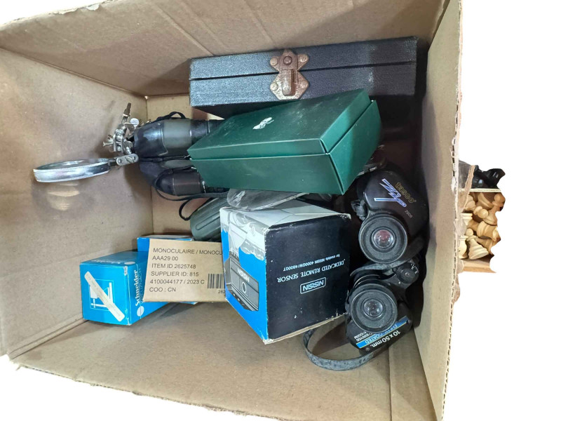 Collection of camera equipment including Nikon D7000 digital camera, Sigma F500mm lens, Nikon D90 camera, lenses and accessories, Celestron telescope, binoculars, monoscope, Staunton chess set, etc.