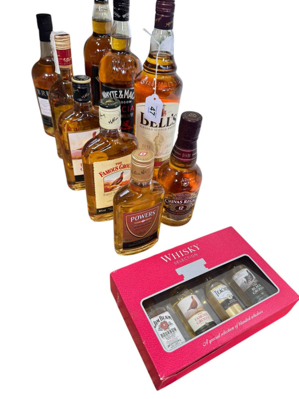 Eight bottles of whisky including two Whyte & Mackay and Chivas Regal, boxed whisky selection and a Bruader Malt whisky liqueur.