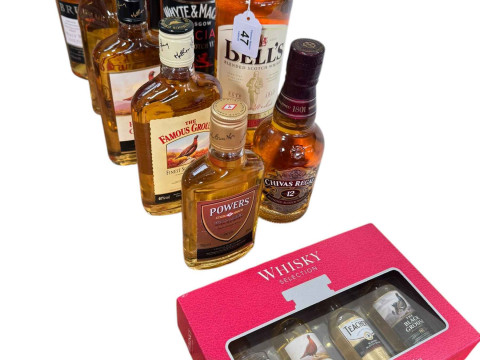 Eight bottles of whisky including two Whyte & Mackay and Chivas Regal,...