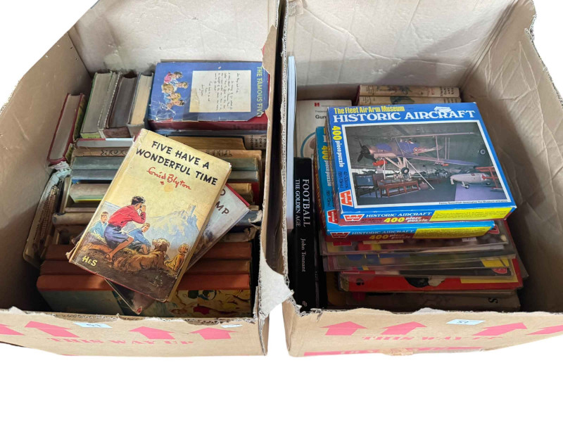 Two boxes of assorted books including Enid Blyton The Famous Five, Football book and programmes, etc.