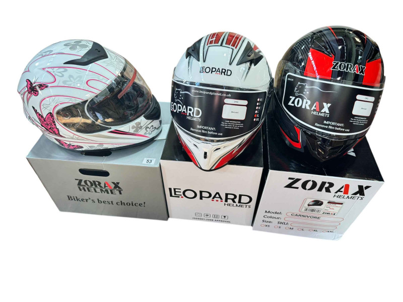 Two Zorax and one Leopard motorcycle helmets (boxed as new).