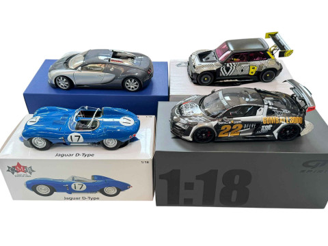 Four assorted model Performance and Rally cars: Bugatti Veyron, Jaguar...