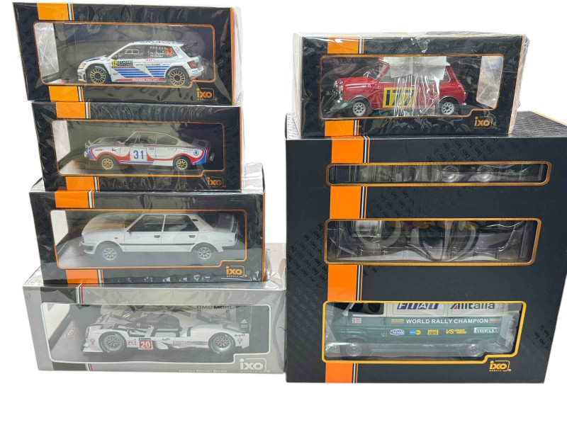 Six IXO models; Fiat 242 Alitalia Rally Team (Assistance) 78/79 with trailor, three Skoda, BMC Morris Cooper and Porsche 919 Hybrid Le Mans 2014 (all boxed).