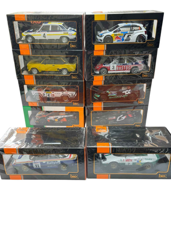 Ten IXO model vehicles including Fiat 131 Abarth 1980 and eight rally cars (all boxed).