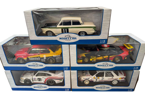 Five Modelcar Group rally car models including BMW 320 GR5, Porsche 935...
