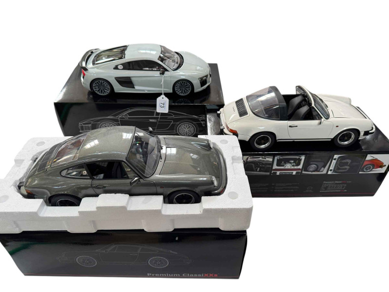 Five Premium Classixxs model cars including Audi R8, Porsche 911 Carrera's and Mini Cooper (all boxed).