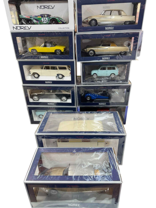 Thirteen Norev model vehicles including Simca Chambord and Caravan, Peugeot 302 Darl'Mat, Porcshe 917K-6Gh Watkins Glen 1970, Citroen DS 19 Le Dandy, Mercedes-Maybach S-Class.