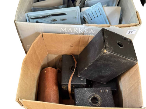 Collection of Air Combat fighter jet models with magazines, four box cameras,...