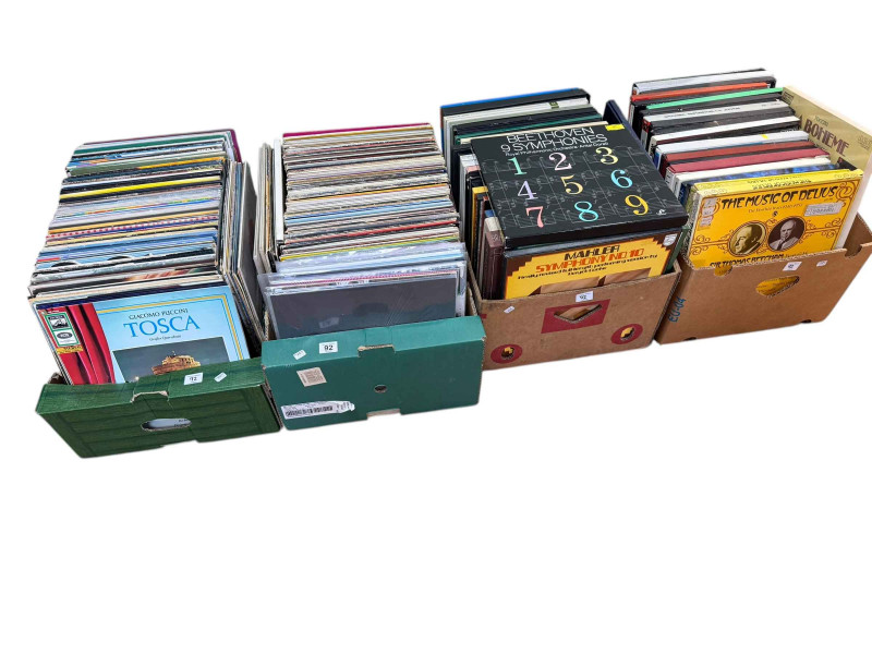 Four boxes of LP records and box sets.