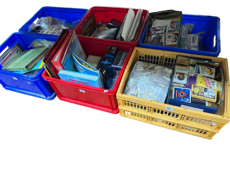 Eleven boxes of collectors cards, annuals, Pokemon cards, assorted tins and framed cigarette cards.