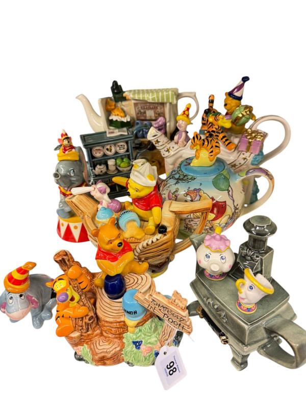 Collection of nine Paul Cardew novelty teapots including seven Disney themed.