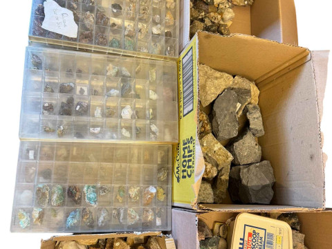 Large collection of mineral stones in boxes and display cases. thumbnail