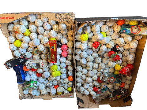 Two boxes of golf balls.