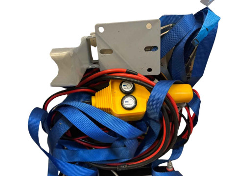 12 Volt powered car winch system with a remote control.