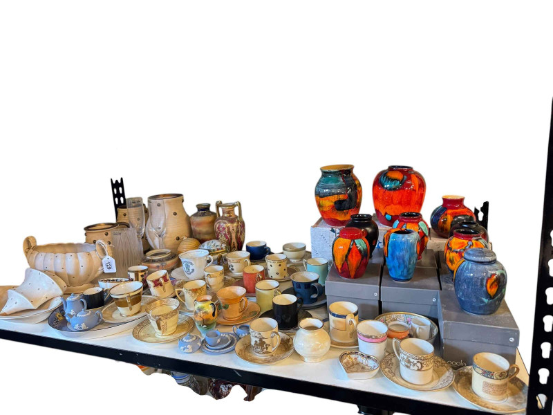 Collection of Poole Pottery vases with boxes, cabinet cups and saucers, pair of Lalique champagne flutes, seven pieces of Bursley Ware Charlotte Rhead Polka Dot pottery, etc.