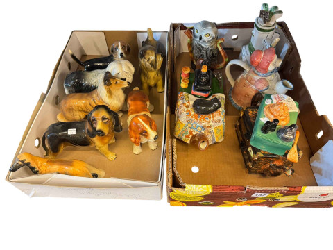 Five novelty teapots and seven dog ornaments.