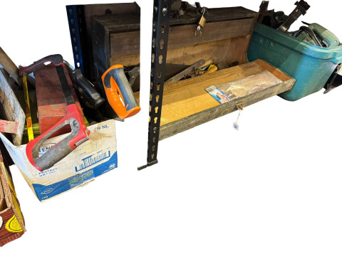 Toolbox and a collection of tools, two wood trestles, etc.