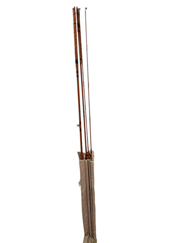 A Sharpe Scottie impregnated fishing rod and bag.