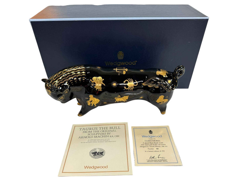 Wedgwood Taurus the Bull in glazed black basalt with raised gold zodiac decoration, number 46/250, boxed with certificate.