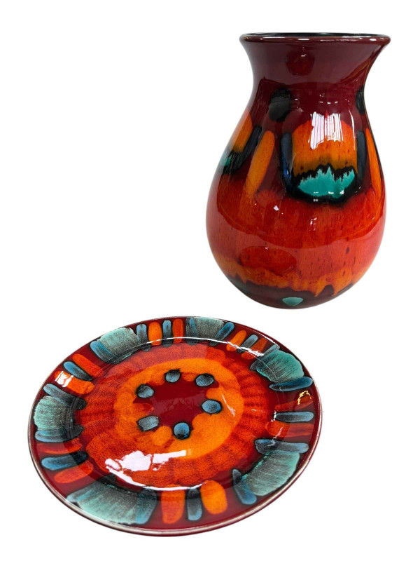 Poole pottery volcano pattern vase and plate.
