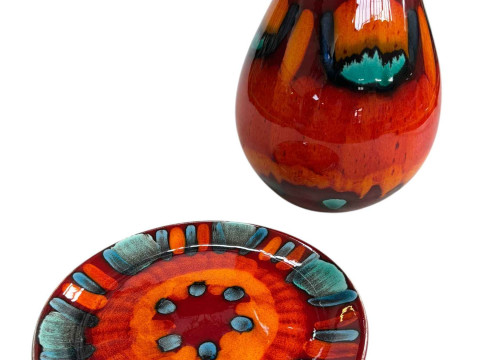 Poole pottery volcano pattern vase and plate.
