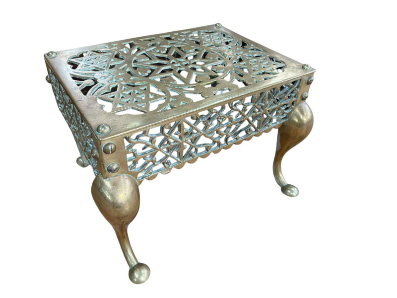 Victorian pierced brass footman.