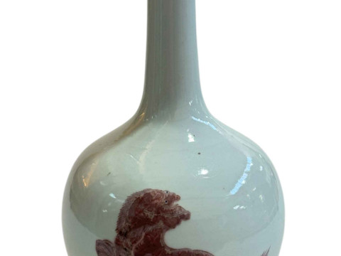 A large Chinese bottle vase painted with foo dogs on white ground, 35cm...