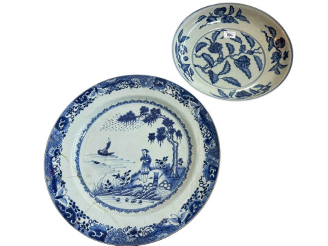 A large 19th Century Chinese blue and white charger, decorated with fishermen...