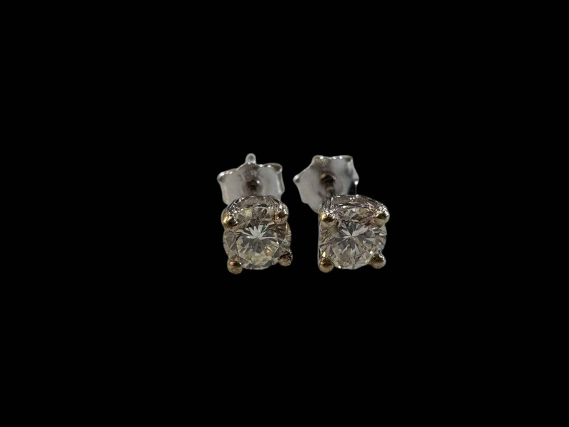 Pair of 18 carat white gold diamond stud earrings (diamonds over 0.5ct).