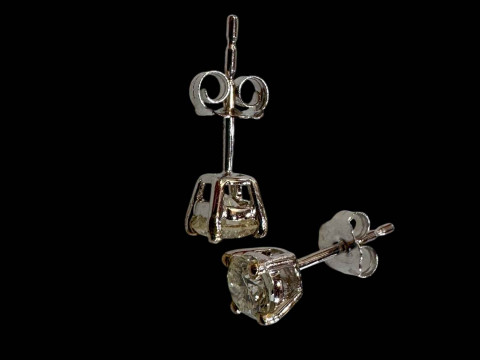 Pair of 18 carat white gold diamond stud earrings (diamonds over 0.5ct).