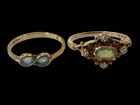 Two 9 carat gold rings set with peridot and aqua.