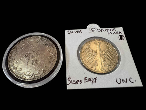 Ottoman Empire silver 20 Kurush and a silver Deutsche five mark coin.