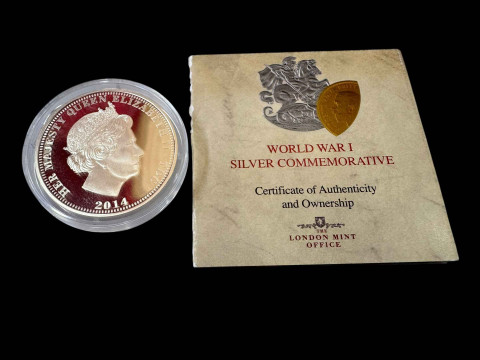 WWI silver commemorative coin with box and certificate.