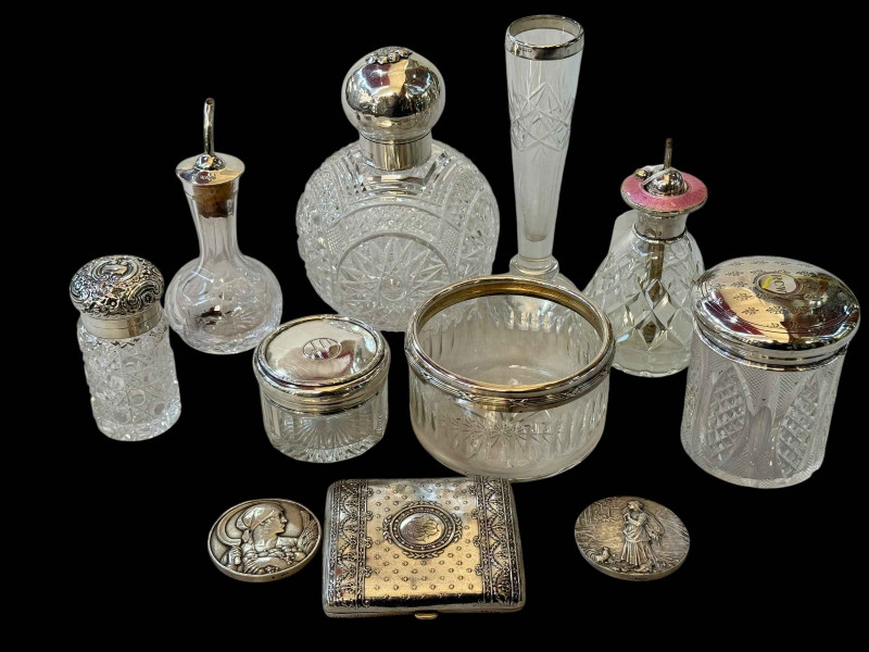 Collection of eleven mostly silver mounted toilet and scent bottles, also two agricultural medals and cigarette case.