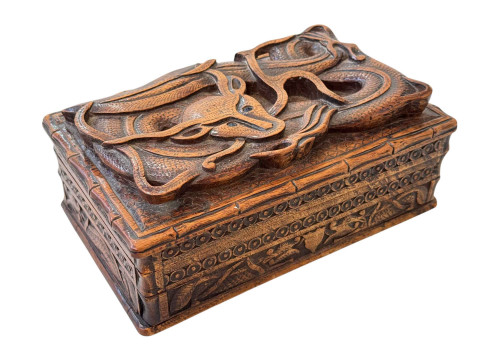 Chinese dragon carved box, 21cm across.