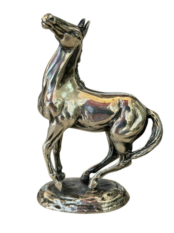Lorne McKean silver horse sculpture Playing Up, a limited edition for The British Horse Society, boxed and with certificate and letter from John Pinches Limited, 11.5cm.