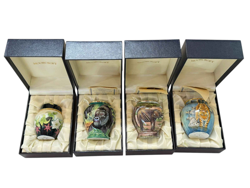 Three Moorcroft enamel vases with certificates including Gorilla 97/200, Elephant 100/200 and Tigers 40/50 and ginger jar Winter Wonderland 12/15.