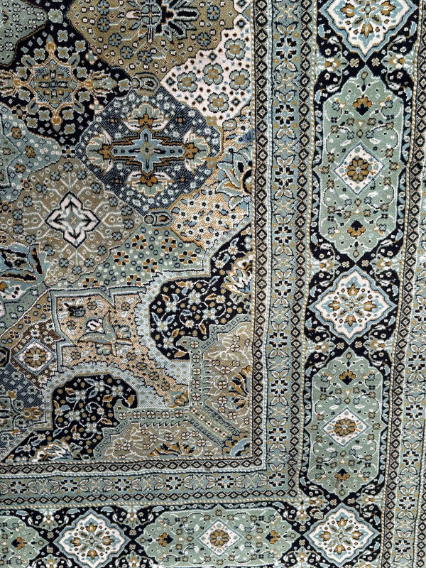 Green ground carpet with central medallion 3.80 by 2.50.